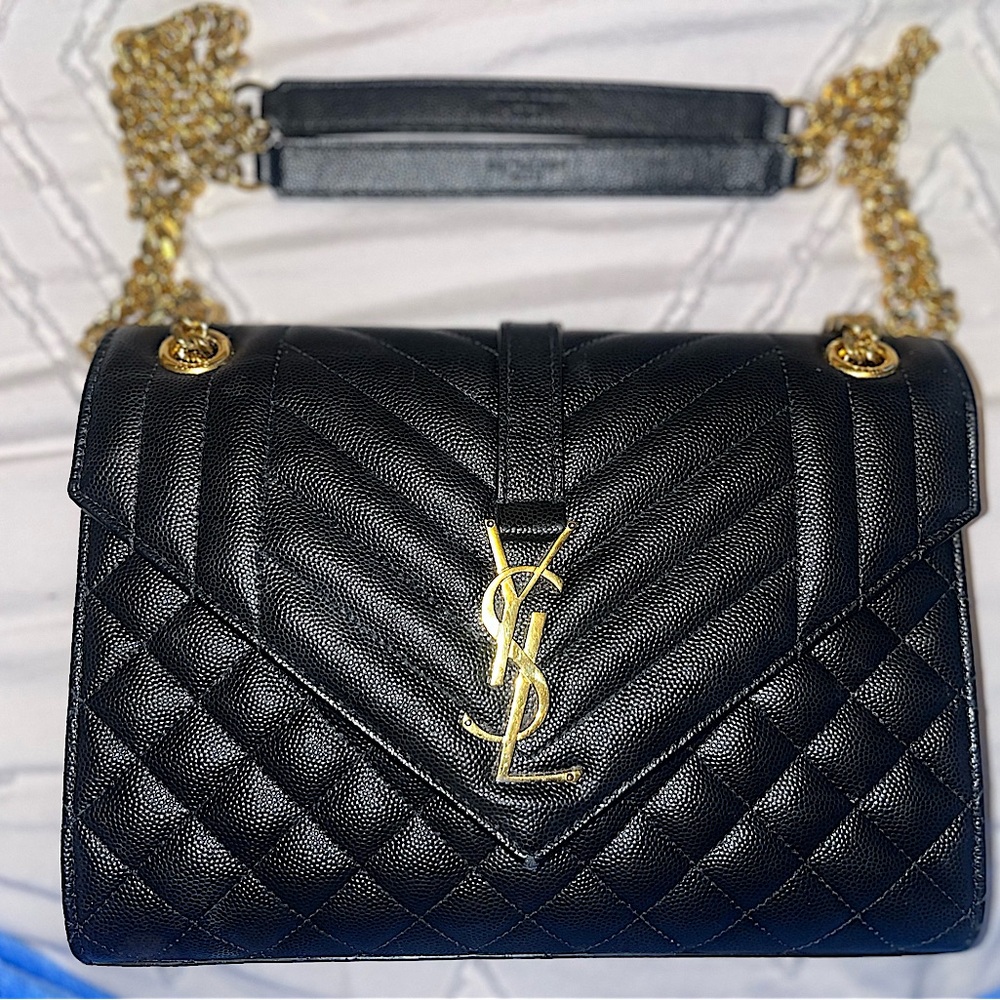 Saint Laurent small, quilted envelope bag.